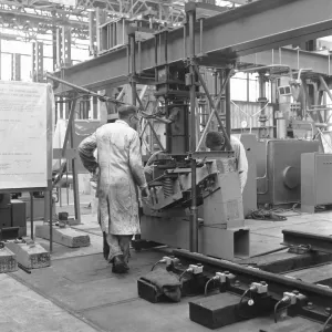Apprentice at the British Rail Research Laboratories electrically testing a rail Apprentice at the British Rail Research Laboratories electrically testing a rail