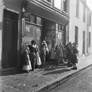 Arab children gather outside a general store on their way to attend the Peel Street Arab children gather outside a general store on their way to attend the Peel Street