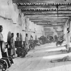 Arab soldiers seen here manning the gun battery at Fort Jelana at Muscat. Circa 1916 Arab soldiers seen here manning the gun battery at Fort Jelana at Muscat. Circa 1916