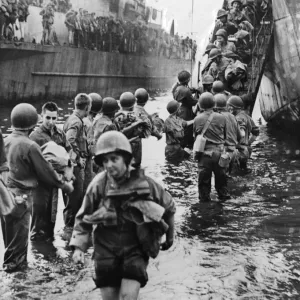 US Army nurse lands in Italy. Her overalls rolled above her knees