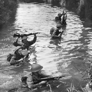Army Training. Young NCOs (Non-commissioned officers) crossing a river Army Training. Young NCOs (Non-commissioned officers) crossing a river