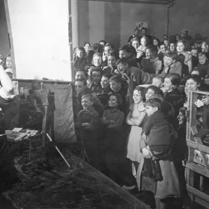 ARP warden John Hunt entertaining school children of Epsom at a South London museum ARP warden John Hunt entertaining school children of Epsom at a South London museum