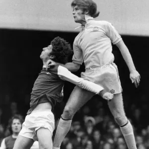 Gordon McQueen Jumps Over Brian Kidd in League Division One Match Print Gordon McQueen Jumps Over Brian Kidd in League Division One Match Print