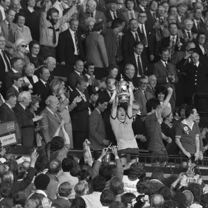 Arsenal captain Pat Rice holds up FA Cup after Arsenal had beaten Manchester United Arsenal captain Pat Rice holds up FA Cup after Arsenal had beaten Manchester United