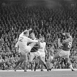 Arsenal defender Don Howe clears the ball from the goal line