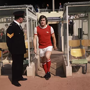 Arsenal footballer Pat Rice walking down tunnel to the pitch. Arsenal v Liverpool, 1975