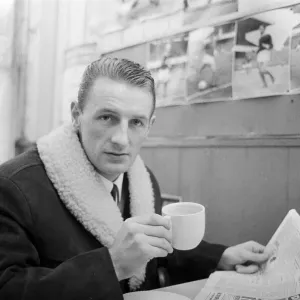 Arsenal inside forward George Eastham sits with a cup of tea in a cafe near his club Arsenal inside forward George Eastham sits with a cup of tea in a cafe near his club