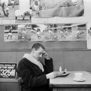 Arsenal inside forward George Eastham sits with a cup of tea in a cafe near his club Arsenal inside forward George Eastham sits with a cup of tea in a cafe near his club