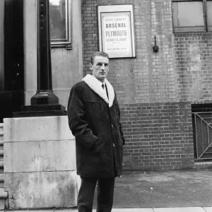 Arsenal inside forward George Eastham stands outside his club Arsenal inside forward George Eastham stands outside his club