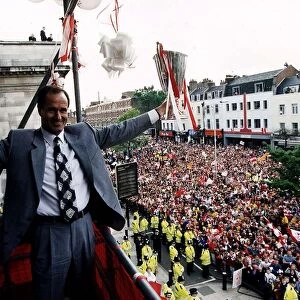 Arsenal Manager George Graham holds the European Cup Winners Cup trophy At Islington Town