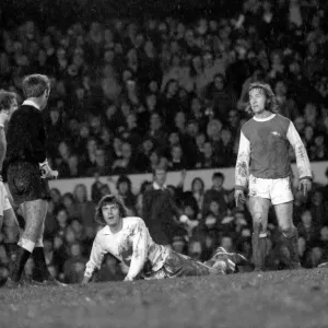 Arsenal vs. Leeds. Peter Lorimer looks at referee Thomas who is about to book him Arsenal vs. Leeds. Peter Lorimer looks at referee Thomas who is about to book him