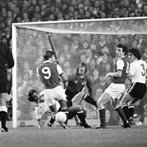 Arsenals attack is led by Malcolm McDonald against the Manchester United goal