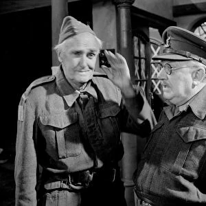 Arthur Lowe who plays Captain Mainwaring (right) and John Laurie (Private Frazer