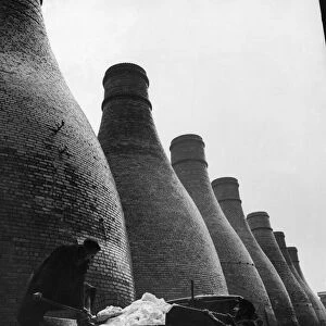 Ash being cleared from a group of potters kilns in Stoke on Trent, Staffordshire