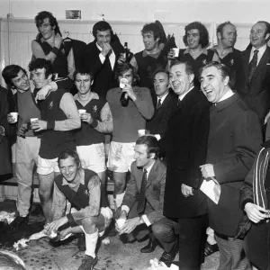 Aston Villa celebrating in the dressing room at Villa Park after their two one victory