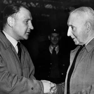 Aston Villa coach Jimmy Hogan shaking hands with manager Eric Houghton