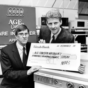 Athlete Steve Cram Steve Cram receives a cheque from Alan Groves of NEEB Athlete Steve Cram Steve Cram receives a cheque from Alan Groves of NEEB
