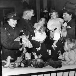 ATS girls and their soldier comrades at a Manchester A. A ATS girls and their soldier comrades at a Manchester A. A