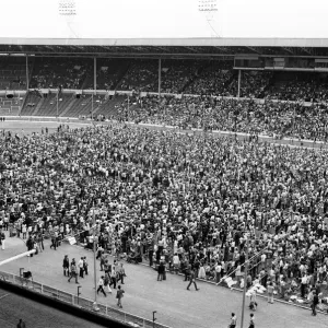 Print of the audience at a 1973 Christian festival at Wembley Arena, London