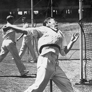 Australian fast bowler Ray Lindwall in the nets. c