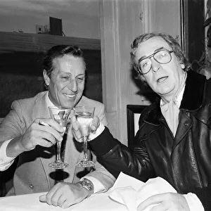 Author Frederick Forsyth having lunch with Michael Caine who starred in the film version