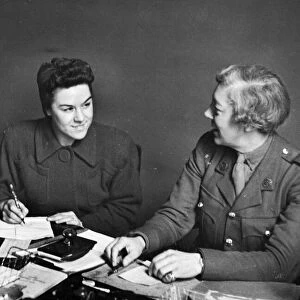 The Auxiliary Territorial Service (ATS) ladies. Caption suggests these are pay clerks