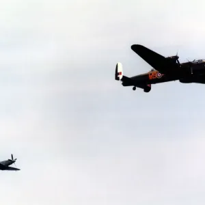An Avro Lancaster bomber and Supermarine Spitfire fighter aircraft of the Battle of An Avro Lancaster bomber and Supermarine Spitfire fighter aircraft of the Battle of