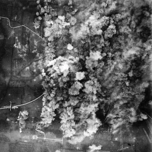 Avro Lancaster planes of RAF Bomber Command carpet bomb a road junction near Villers Avro Lancaster planes of RAF Bomber Command carpet bomb a road junction near Villers