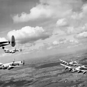 Avro Lancasters bomber from 35 Squadron in flight over the English countryside Avro Lancasters bomber from 35 Squadron in flight over the English countryside