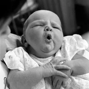 Baby girl yawns in the childrens hospital in Myrtle street, Liverpool
