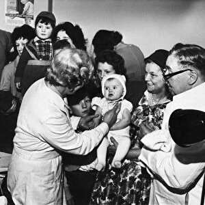 A baby being vaccinated at Halton Road divisional health centre in Runcorn