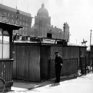 In the background the stately Dock Board building. In the foreground a corner of