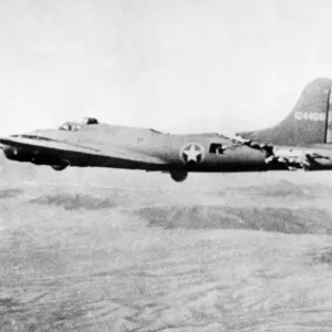 A badly damaged Boeing B-17F-5-BO Flying Fortress, 41-24406, All American III A badly damaged Boeing B-17F-5-BO Flying Fortress, 41-24406, All American III