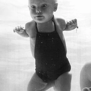 Bahama Lynch the underwater baby, 5months old. Bahama crawls around with her eyes wide