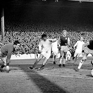 The ball comes across the box for Manchester United star George Best to score his sides