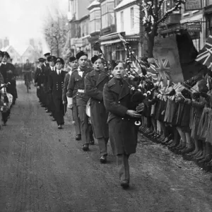 The band of an Army Technical School leads the parade of Officers