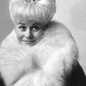 Barbara Windsor in a black outfit that she might wear for the Royal premiere of her new