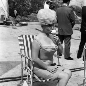 Barbara Windsor, a tiny five feet nothing, is described as a cute Barbara Windsor, a tiny five feet nothing, is described as a cute