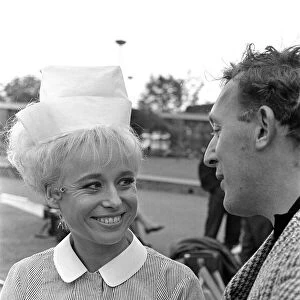 Barbara Windsor (with unknown male) on the film set of Carry On Doctor
