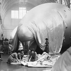 A barrage balloon is a large unmanned tethered kite balloon used to defend ground targets