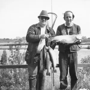 Aveley Lake Print: Two men with a catch of four five-pond rainbow trout Aveley Lake Print: Two men with a catch of four five-pond rainbow trout