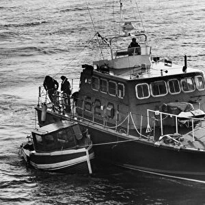 Barry lifeboat rescue four men from a cabin cruiser. After they brought the men to