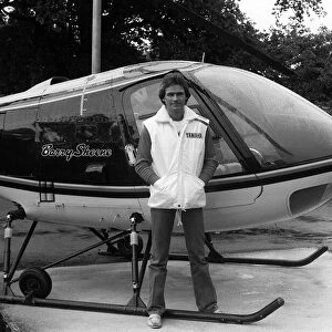 Barry Sheene with his private helicopter at home. 25th May 1981