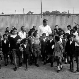 Basil D Oliveira Cricket Player in South Africa with a group of children Basil D Oliveira Cricket Player in South Africa with a group of children
