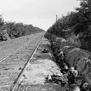 Battle of Hofstade. Belgian soldiers shelter in a trench beside a railway line