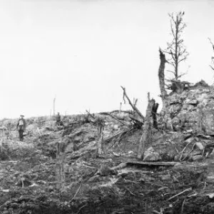 Battle of Messines Ridge. British troops viewing the smashed remains of a German bunker