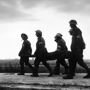 Battle of the Somme: A stretcher case seen in silhouette being brought in from La