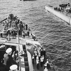 Battlecruiser HMS Sheffield welcomed home after returning from operations against Battlecruiser HMS Sheffield welcomed home after returning from operations against