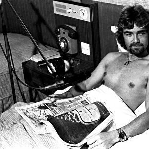 BBC Radio One DJ Noel Edmonds doing his breakfast radio show from his bed at the Centre