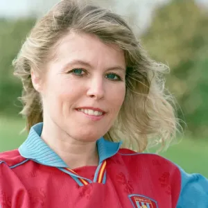 BBC Radio WM presenter Julie Mayer in an Aston Villa kit at the club